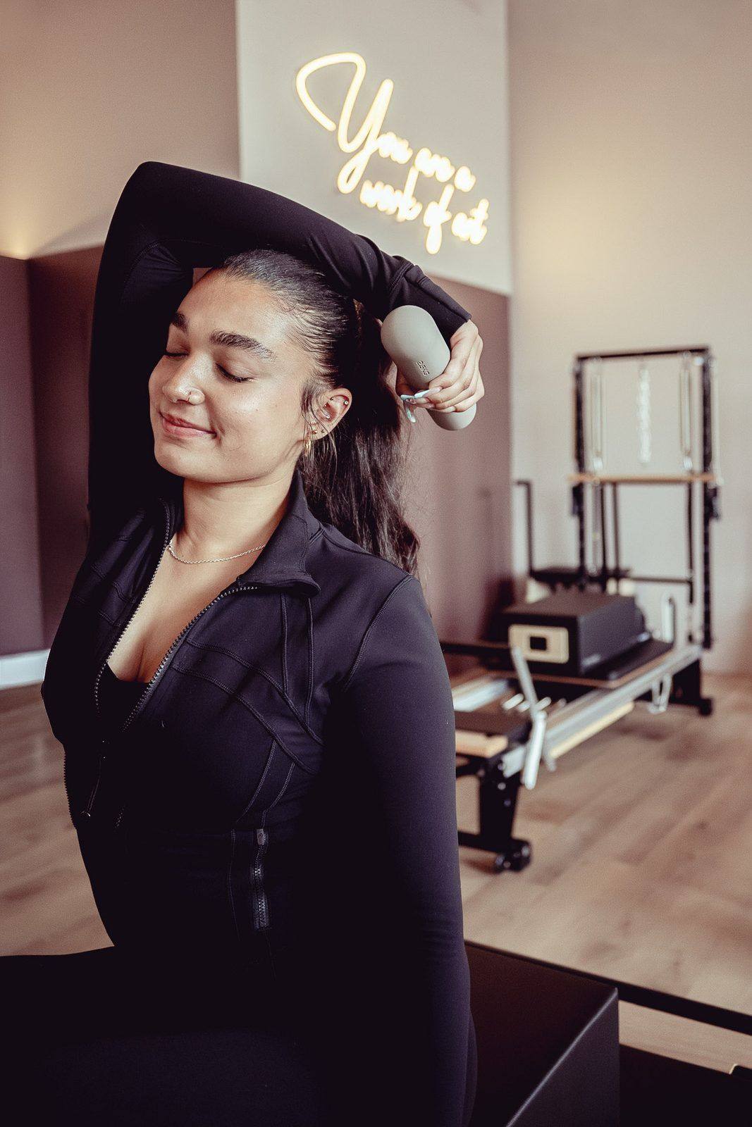 A mixed-level reformer class working at their own pace at Leaside Pilates